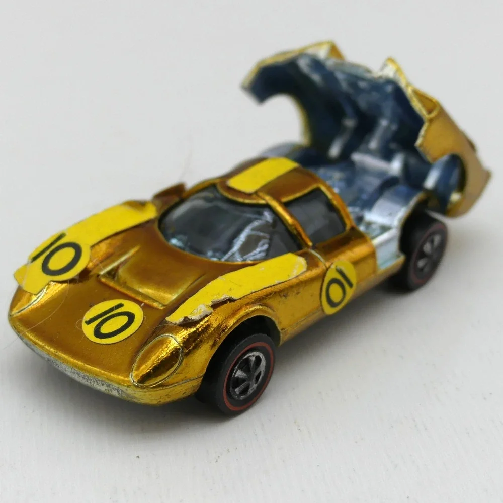 VTG 1968 Mattel Hot Wheels Lola GT-70 Gold Redline Diecast Car w/ Sticker